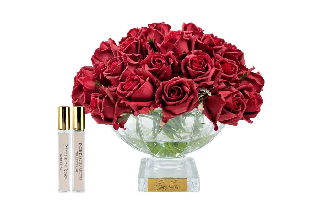 Un centre de table Côte Noire d’exception : 37 boutons de rose rouge ultra réalistes, disposés avec grâce dans un vase élégant, parfum délicat inclus. Une pièce luxueuse qui incarne émotion et esthétique.