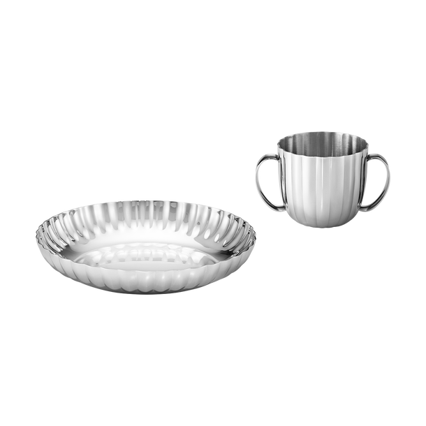 set enfant assiette + tasse inox signé bernadotte Set enfant assiette + tasse inox signé Bernadotte